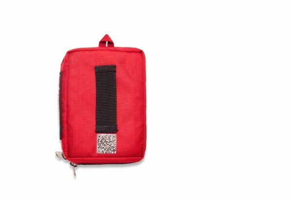 Red fabric pouch with a QR code on a white label, designed as a Survival Compact Kit.